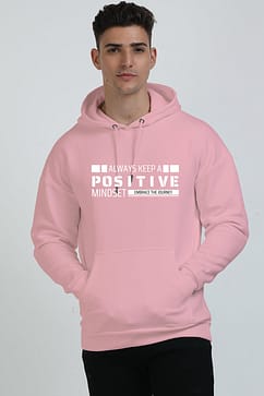 Person wearing a pink hoodie with the text "Always Keep a Positive Mindset" on the front.