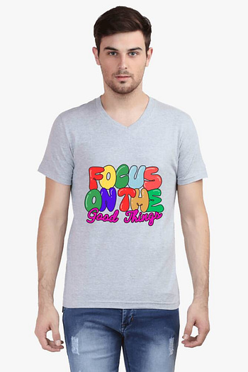 A light gray v neck t shirt with a vibrant ‘Love’ graphic,