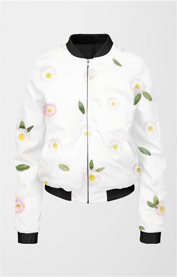 A white bomber jacket for women with a black collar, cuffs, and hem featuring a floral pattern of pink daisies with yellow centers and green leaves. The jacket has a front zipper and two side pockets.